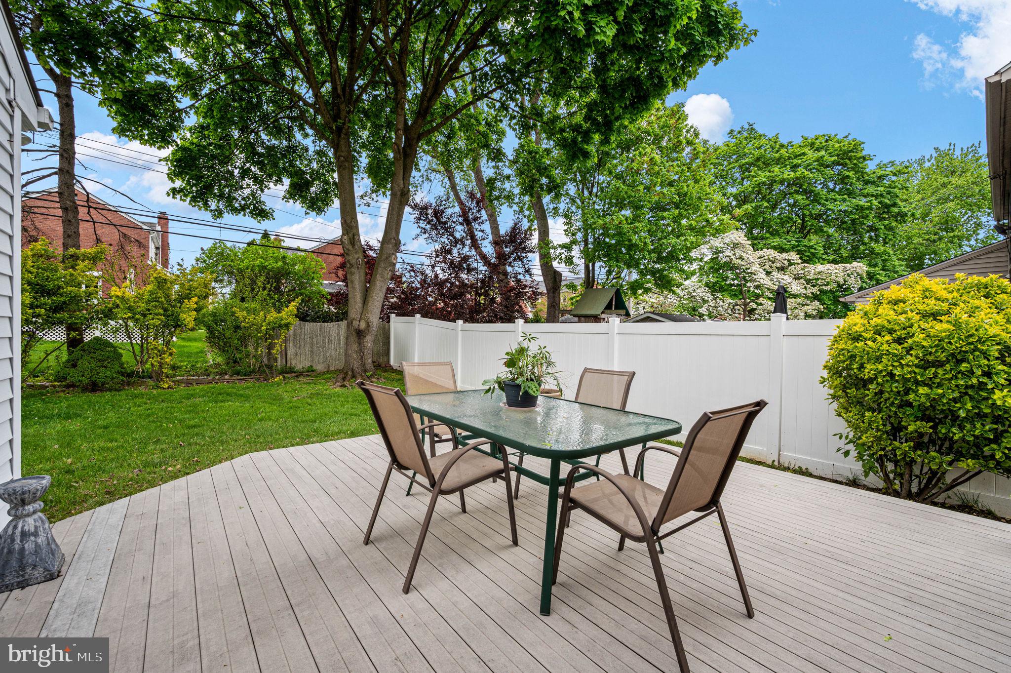 481 Maplewood Road Springfield, PA 19064 - Photo 28 of 31 a view of a backyard with a patio and table