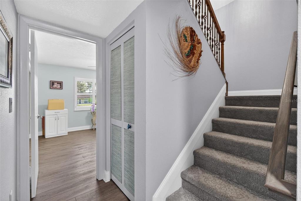 2811 Rampart Circle, Unit 2811 Clearwater, FL 33761 - Photo 19 of 30 a view of entryway and hall with wooden floor