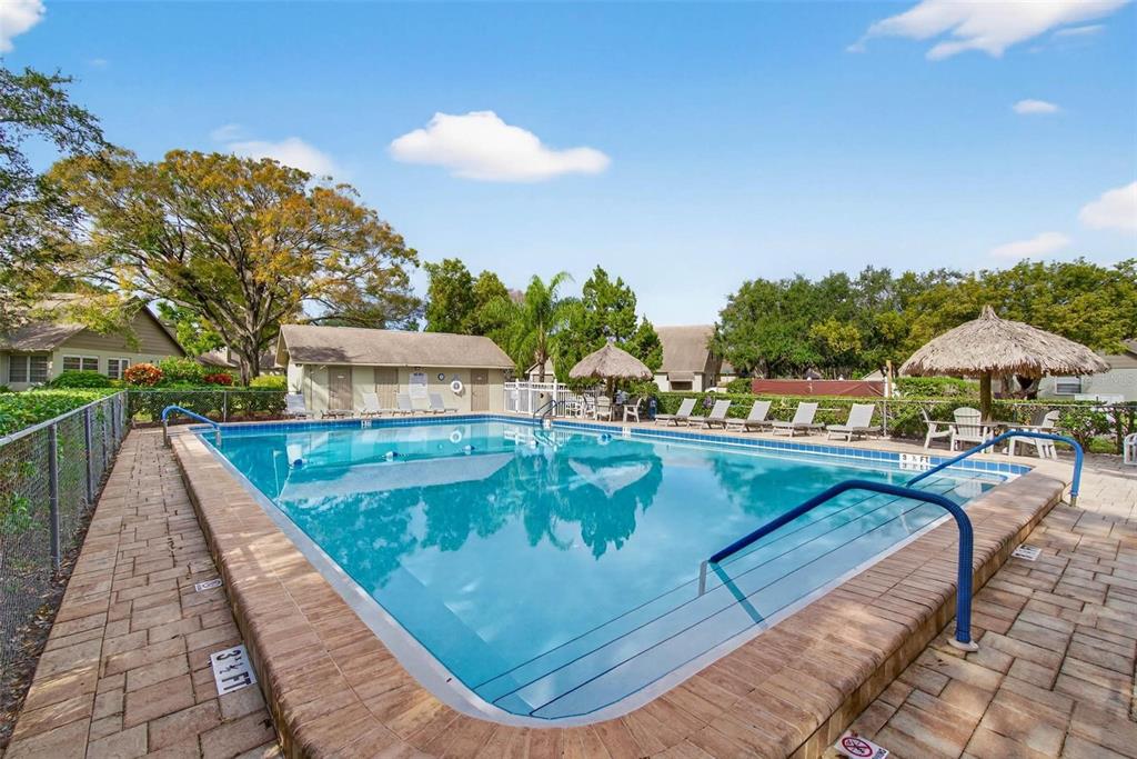 2811 Rampart Circle, Unit 2811 Clearwater, FL 33761 - Photo 29 of 30 swimming pool view with a seating space