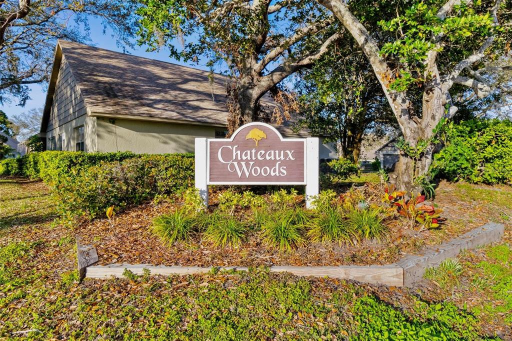 2811 Rampart Circle, Unit 2811 Clearwater, FL 33761 - Photo 30 of 30 a sign that is on a brick wall