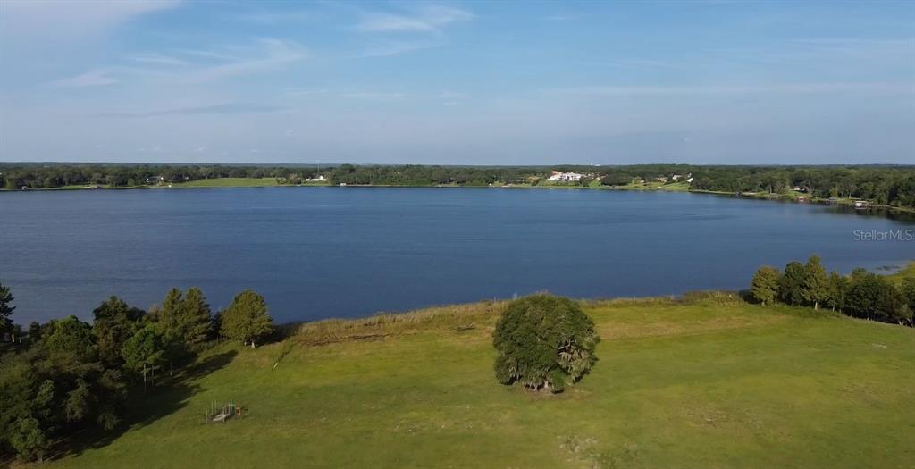 Lot B Burhans Road Eustis, FL 32736 - Photo 6 of 10 a view of a lake with a yard