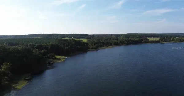 a view of a lake with a mountain in the background