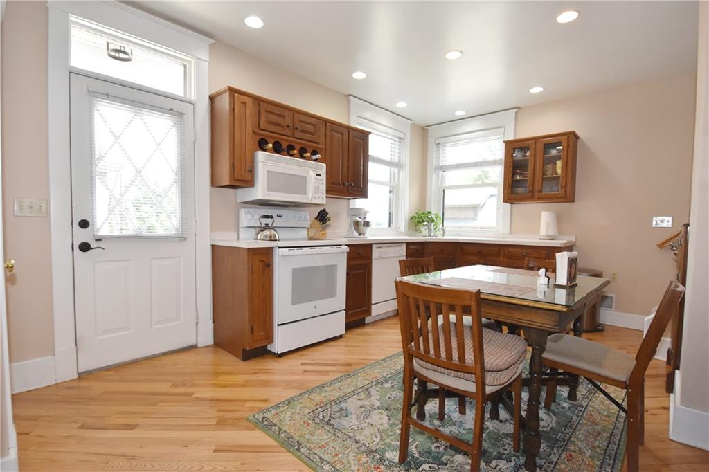 3325 Brownsville Road Pittsburgh, PA 15227 - Photo 12 of 30 a kitchen with a dining table chairs and window