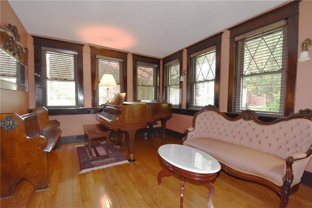 3325 Brownsville Road Pittsburgh, PA 15227 - Photo 15 of 30 a living room with furniture and a large window