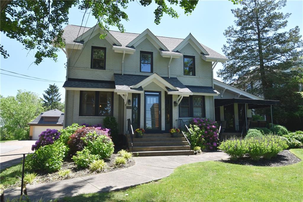 3325 Brownsville Road Pittsburgh, PA 15227 - Photo 2 of 30 a front view of a house with a garden