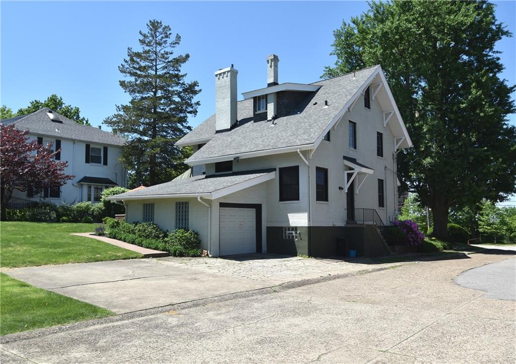 3325 Brownsville Road Pittsburgh, PA 15227 - Photo 26 of 30 a front view of a house with a garden