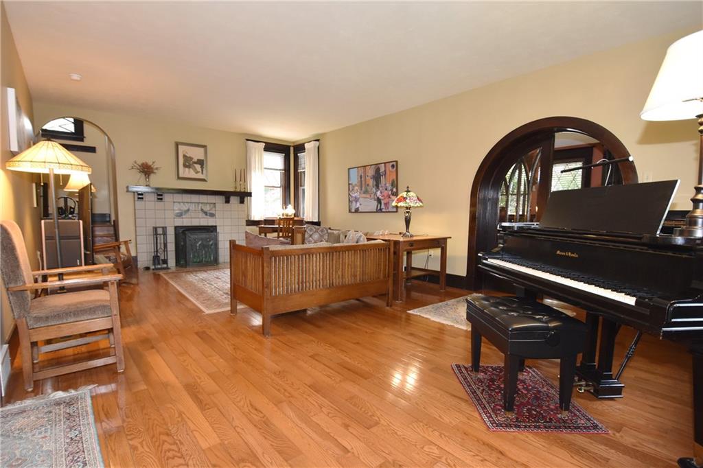 3325 Brownsville Road Pittsburgh, PA 15227 - Photo 5 of 30 a living room with furniture and a piano