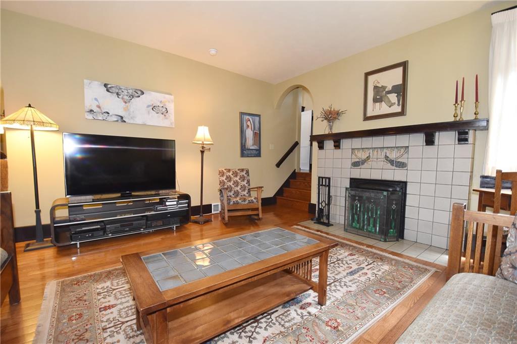 3325 Brownsville Road Pittsburgh, PA 15227 - Photo 6 of 30 a living room with furniture and a flat screen tv