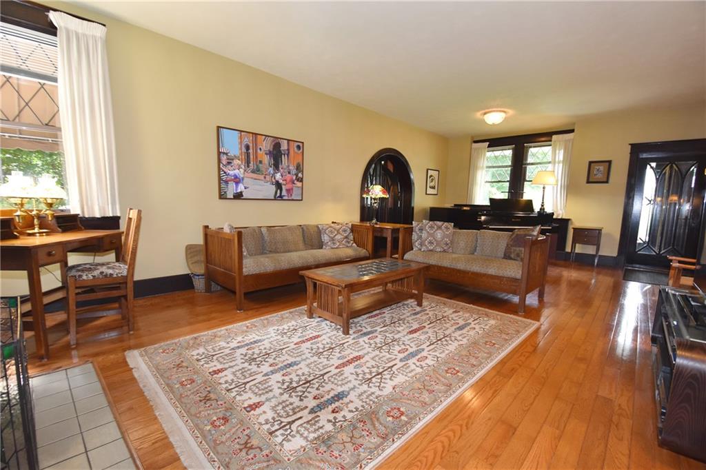 3325 Brownsville Road Pittsburgh, PA 15227 - Photo 7 of 30 a living room with furniture and a wooden floor