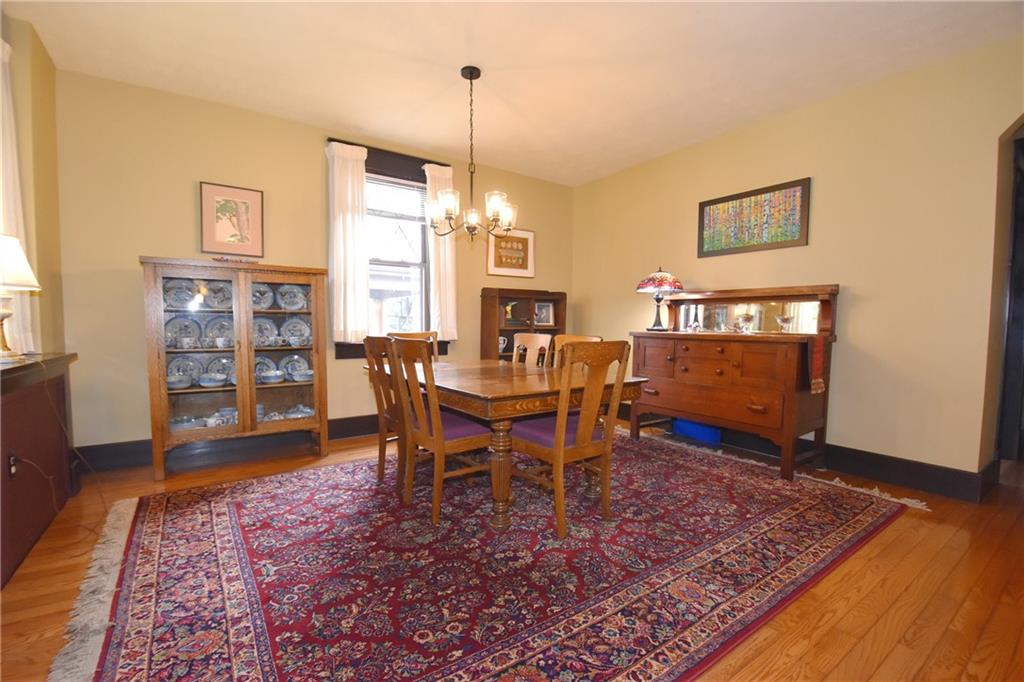 3325 Brownsville Road Pittsburgh, PA 15227 - Photo 10 of 30 a view of a dining room with furniture window and wooden floor
