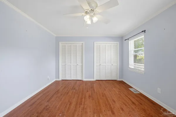 an empty room with a empty space and a window