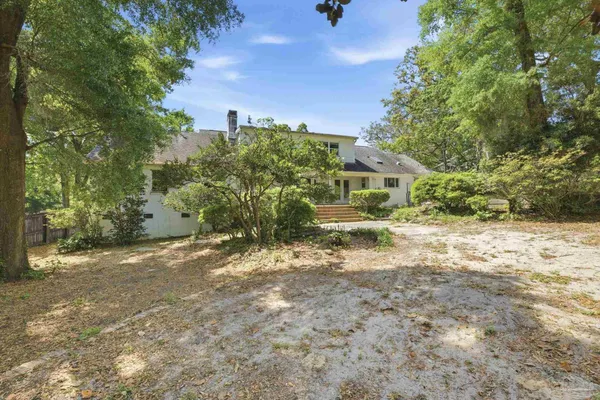 a view of backyard with green space