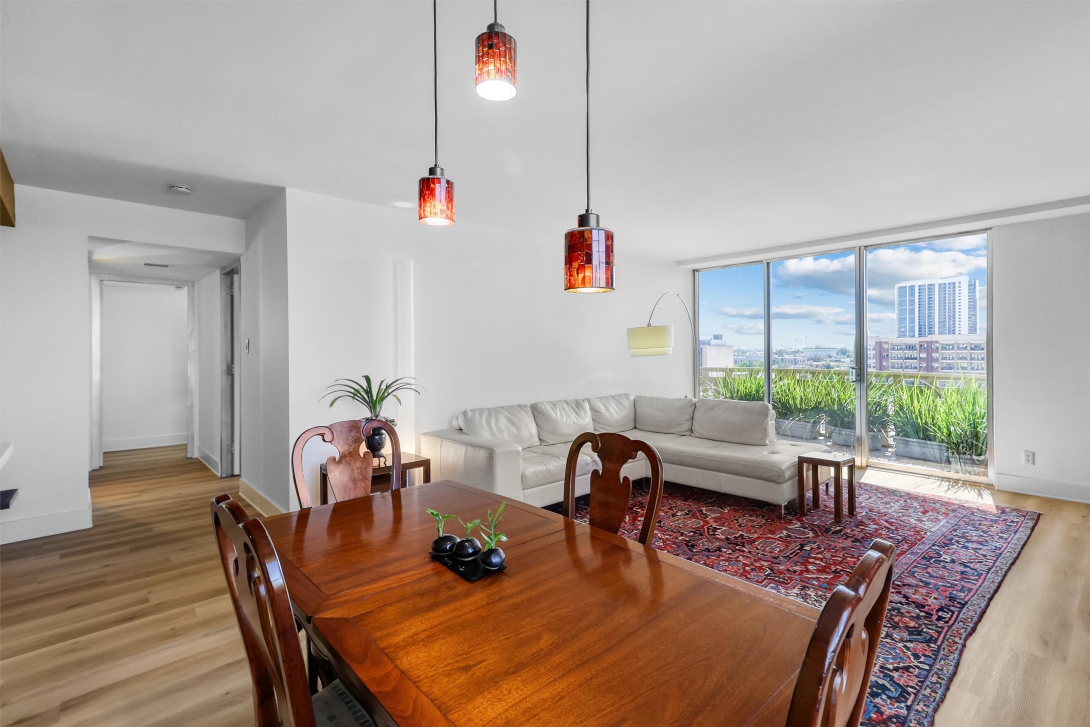 2016 Main Street, Unit 722 Houston, TX 77002 - Photo 11 of 38 a living room with furniture and a window
