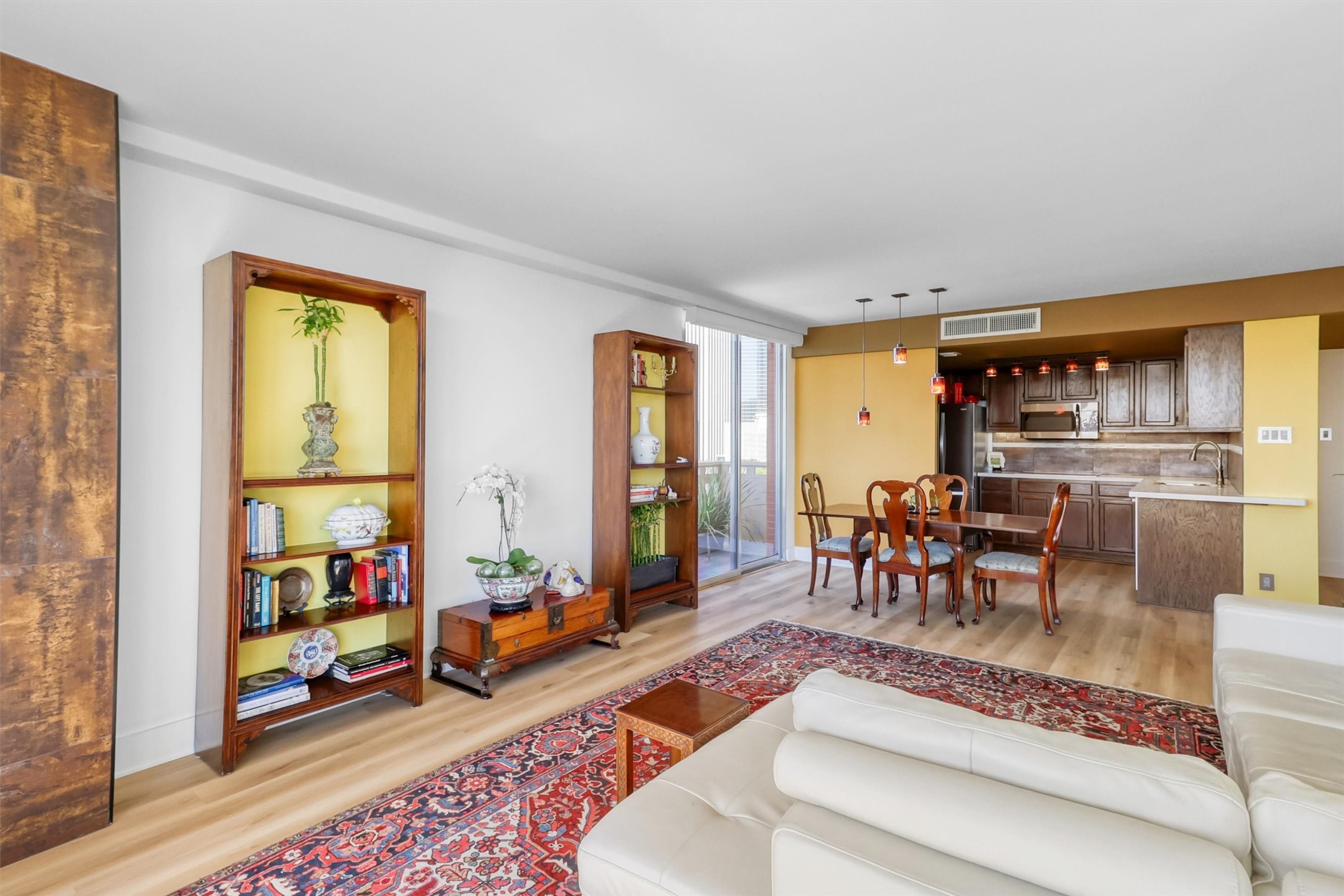 2016 Main Street, Unit 722 Houston, TX 77002 - Photo 15 of 38 a living room with furniture and a dining table