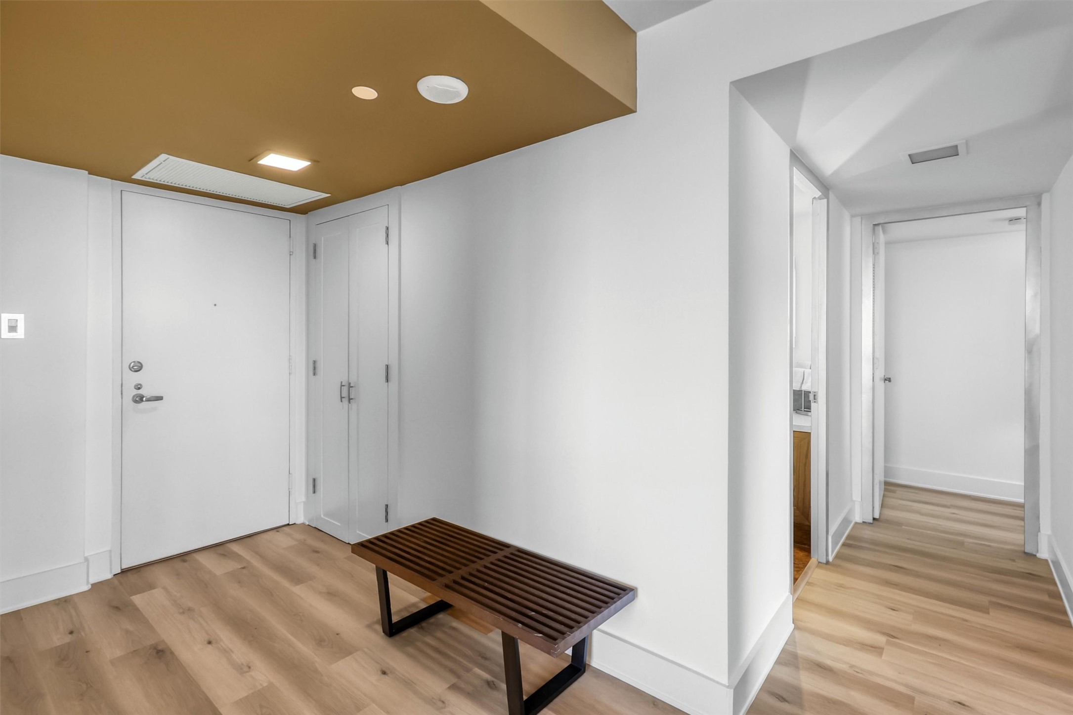 2016 Main Street, Unit 722 Houston, TX 77002 - Photo 17 of 38 a view of a hallway with wooden floor