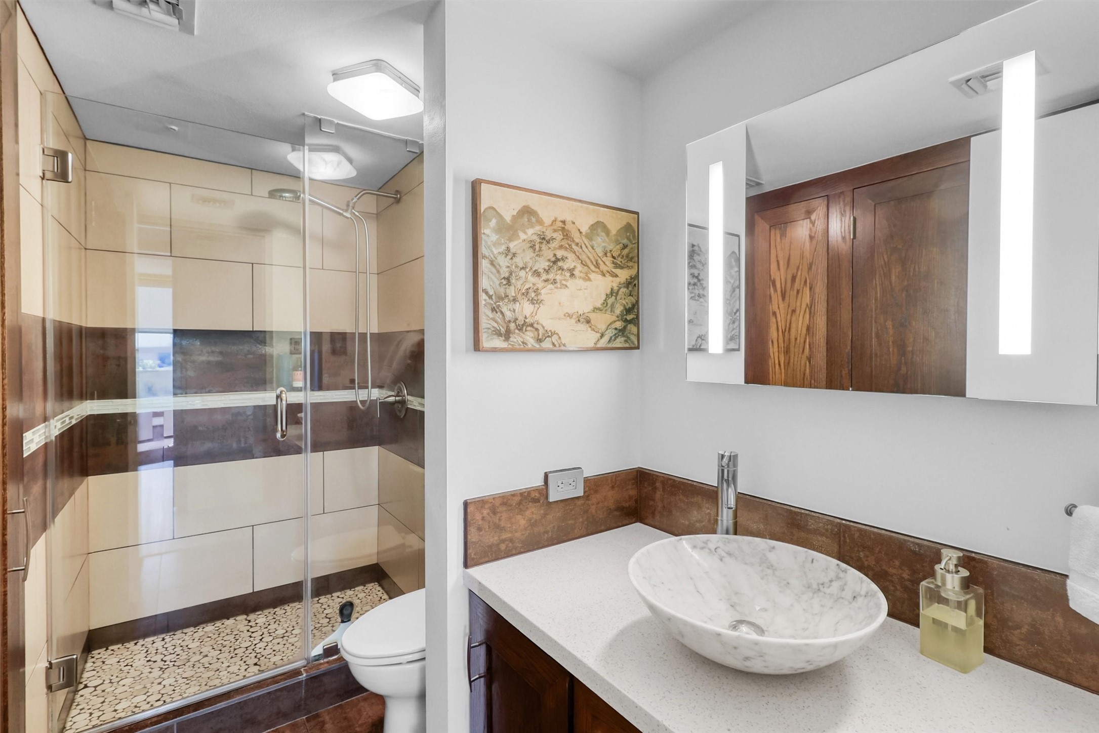 2016 Main Street, Unit 722 Houston, TX 77002 - Photo 19 of 38 a bathroom with a sink toilet and shower