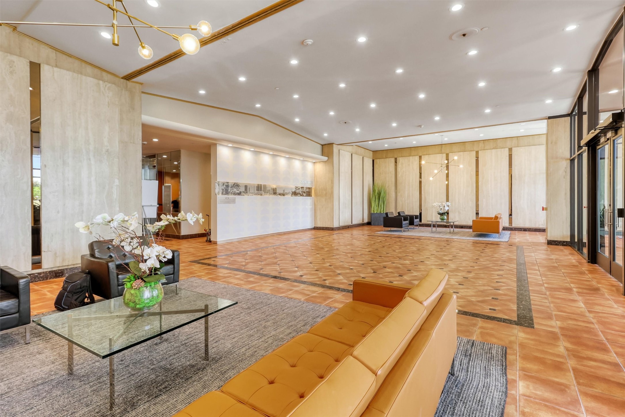 2016 Main Street, Unit 722 Houston, TX 77002 - Photo 3 of 38 a lobby with furniture and a rug