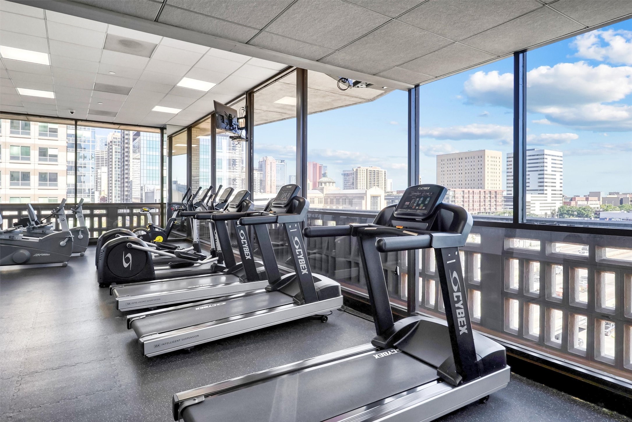 2016 Main Street, Unit 722 Houston, TX 77002 - Photo 36 of 38 a living room with patio furniture and a large window