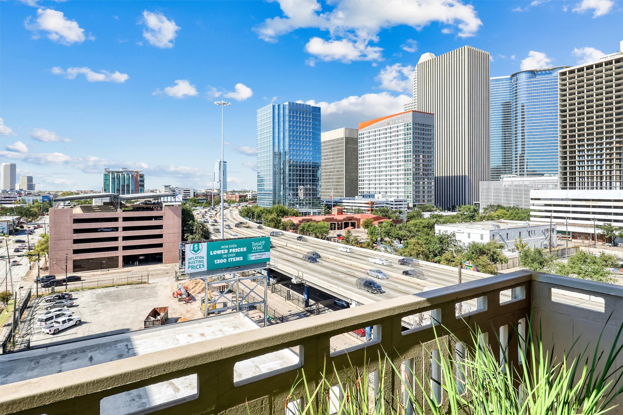 2016 Main Street, Unit 722 Houston, TX 77002 - Photo 7 of 38 a view of a balcony dining table and chairs