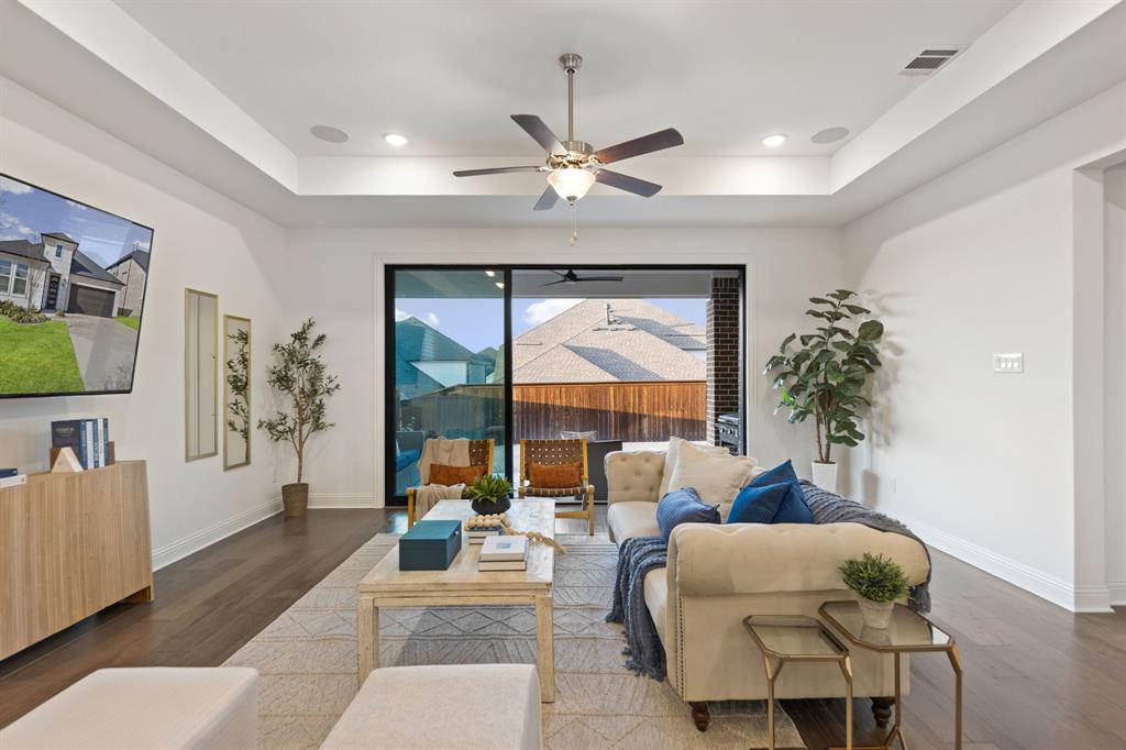 1517 Miranda Lane Denton, TX 76210 - Photo 11 of 37 a living room with furniture and a large window