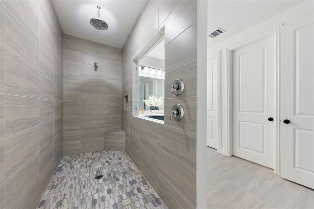 1517 Miranda Lane Denton, TX 76210 - Photo 17 of 37 a bathroom with a shower