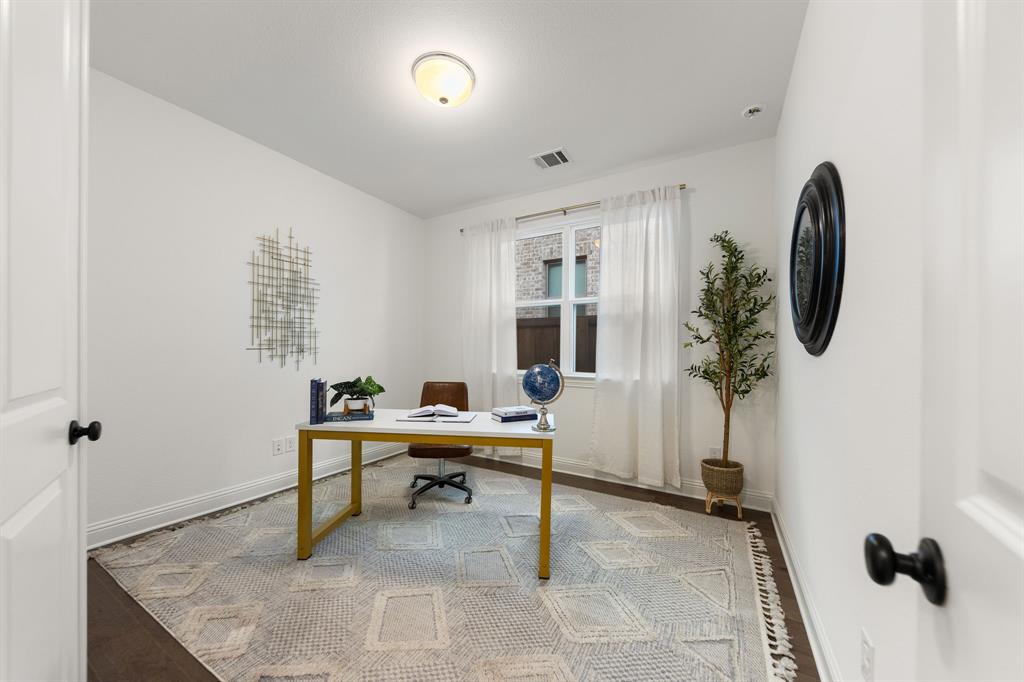 1517 Miranda Lane Denton, TX 76210 - Photo 21 of 37 a room with furniture and a window