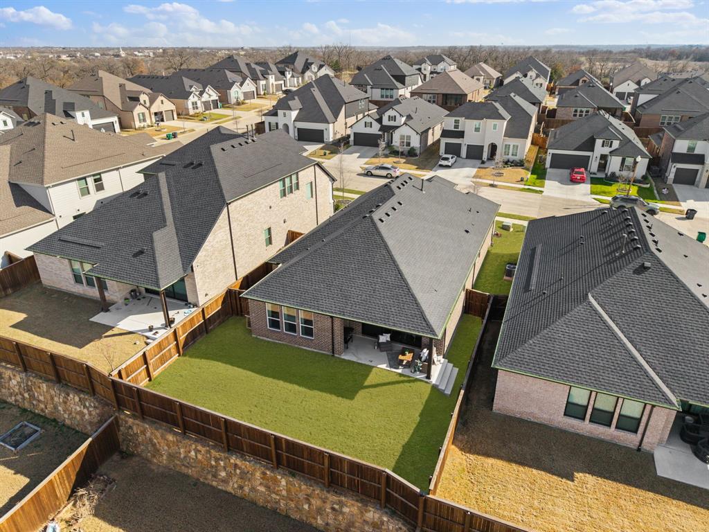 1517 Miranda Lane Denton, TX 76210 - Photo 30 of 37 an aerial view of a house with a big yard