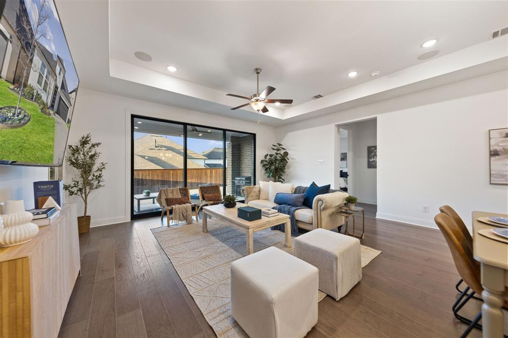 1517 Miranda Lane Denton, TX 76210 - Photo 10 of 37 a living room with furniture and a large window
