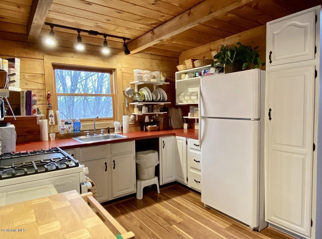 30 Avery Road Buckland, MA 01339 - Photo 8 of 26 a kitchen with refrigerator and window