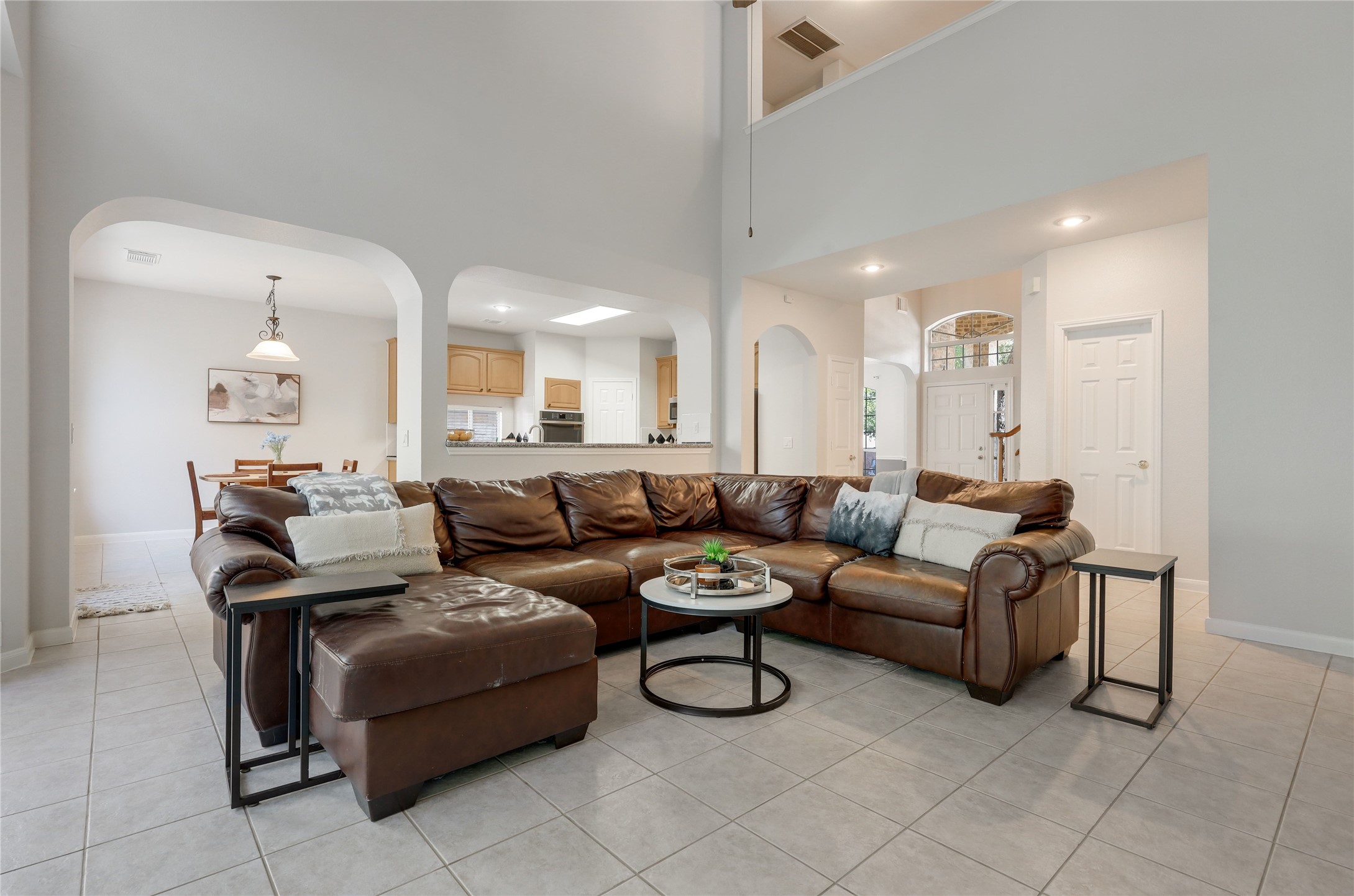 225 Trophy Pass Austin, TX 78748 - Photo 12 of 30 The layout gives you the flexibility to set up the living room in a way that works best for you.