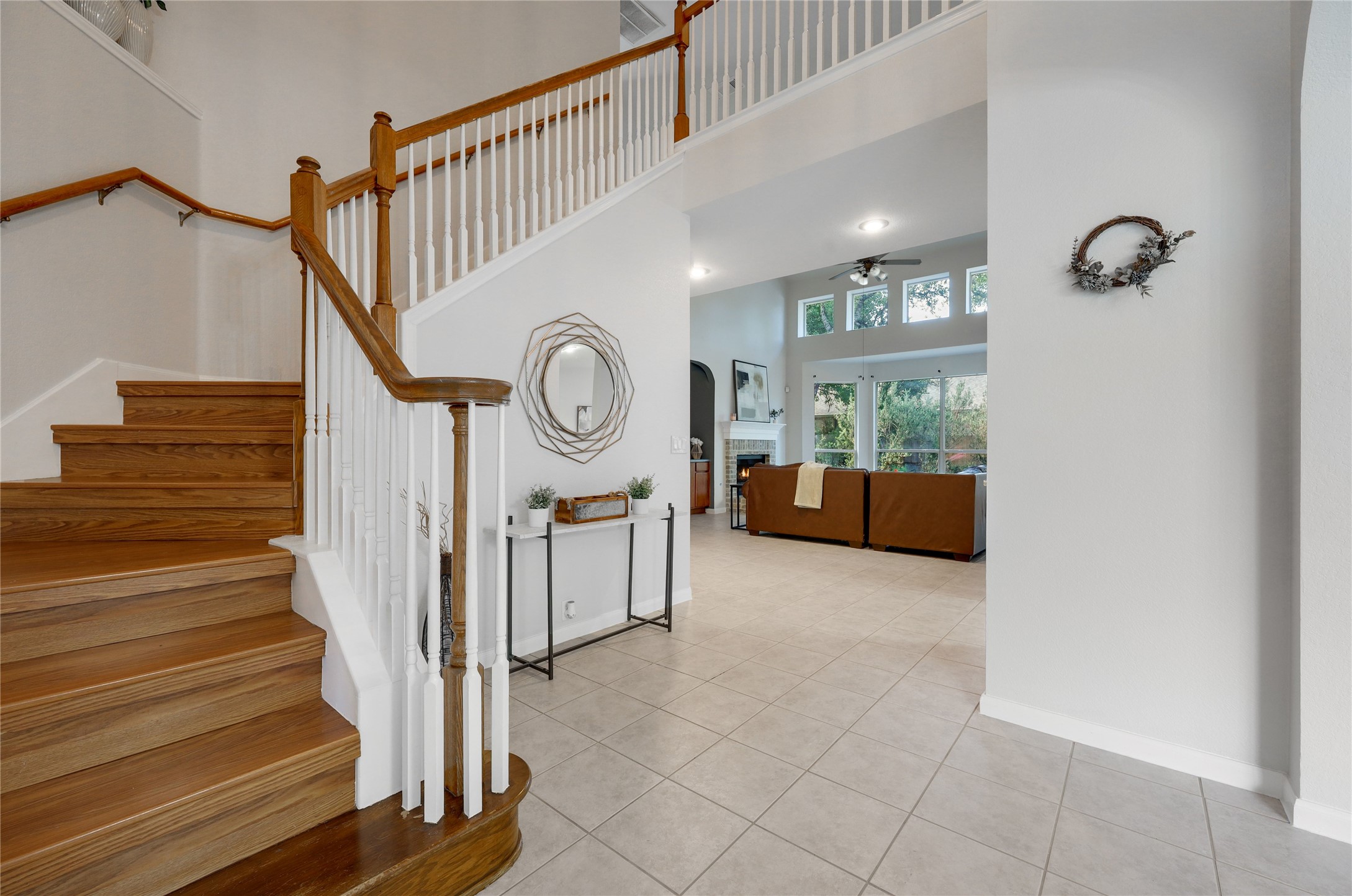 225 Trophy Pass Austin, TX 78748 - Photo 6 of 30 This split level layout features the main living area downstairs and the bedrooms upstairs.