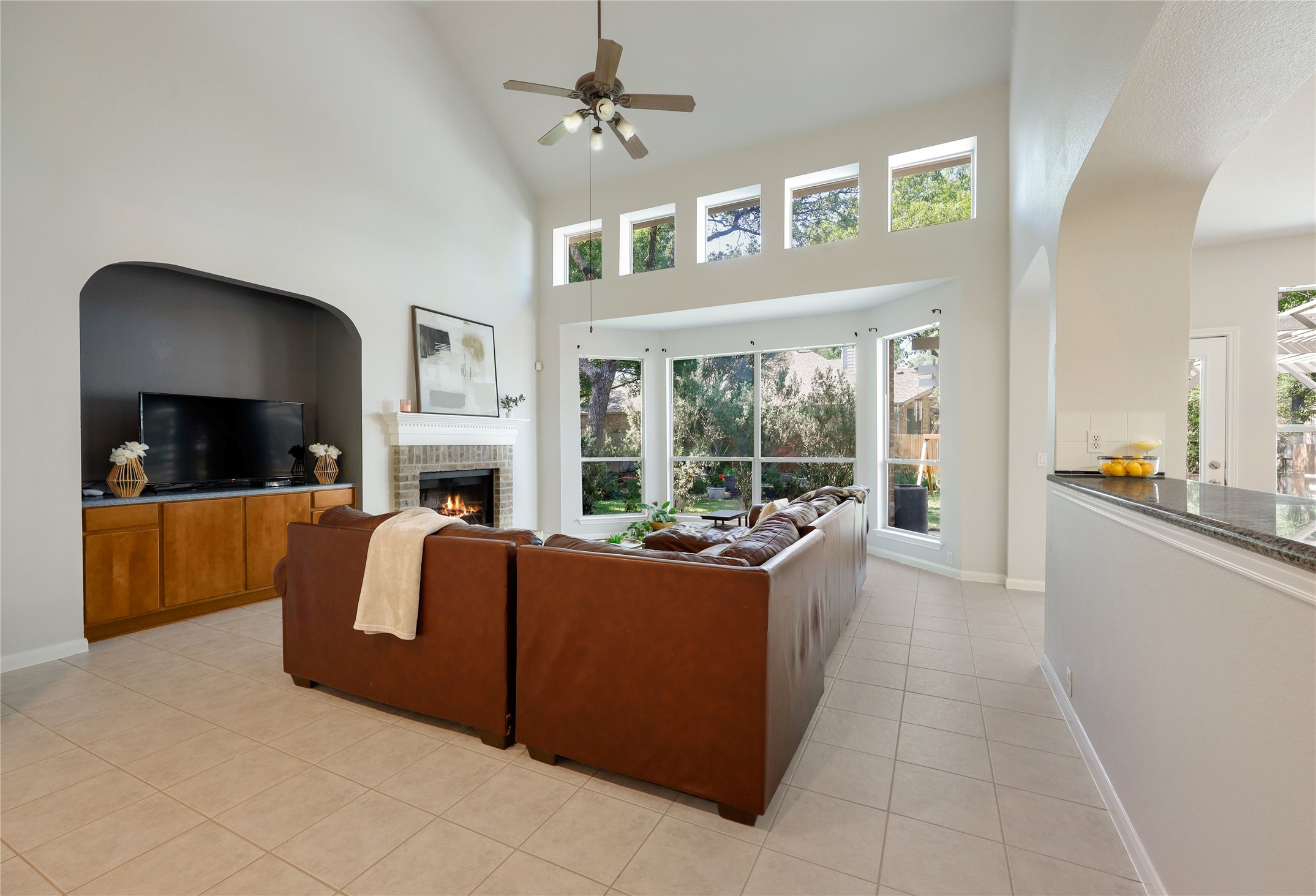 225 Trophy Pass Austin, TX 78748 - Photo 10 of 30 A wall of windows with allows the natural light in by day and moonlight by night.
