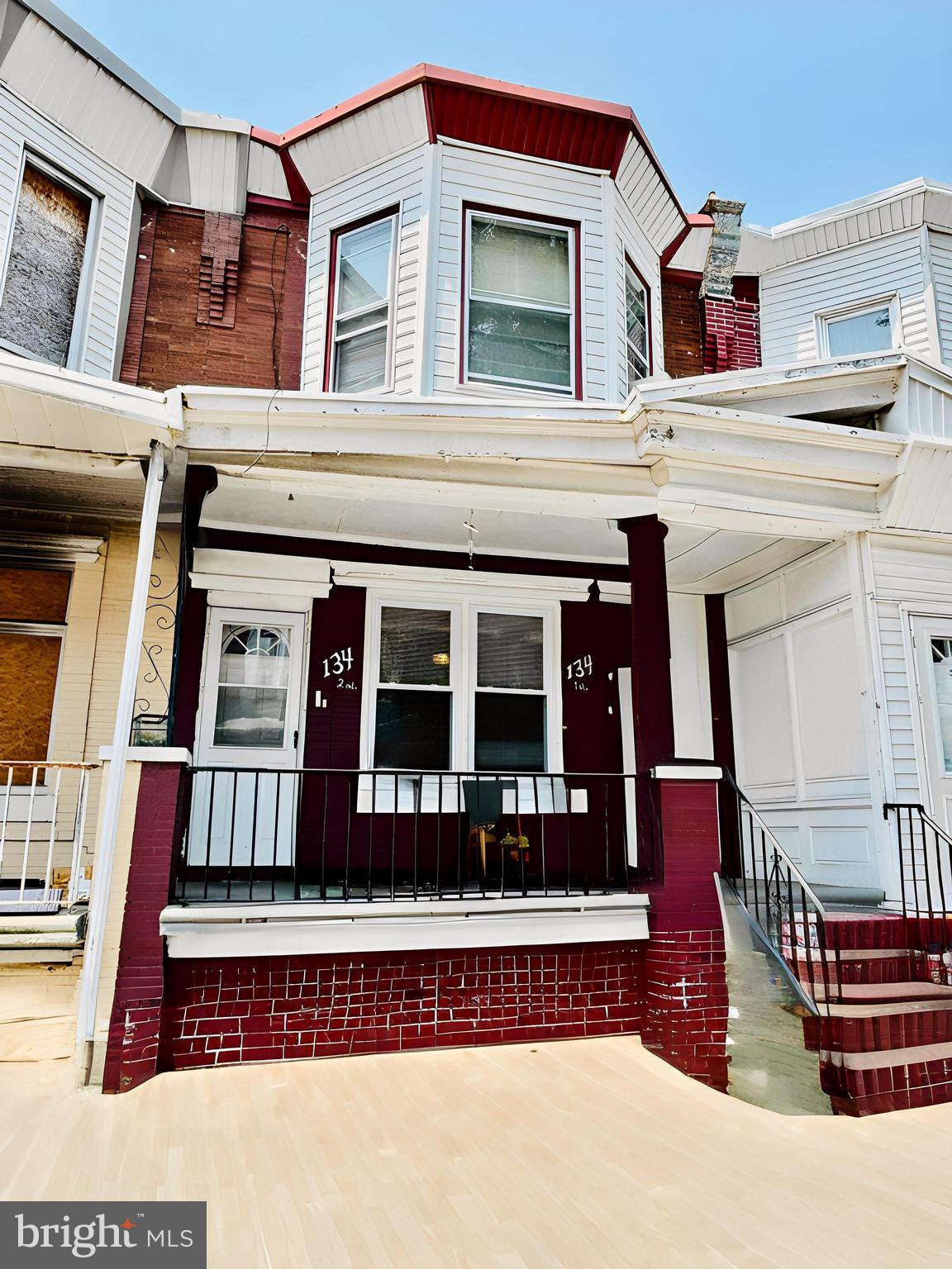134 North Ruby Street Philadelphia, PA 19139 - Photo 1 of 34 a front view of a house with a porch