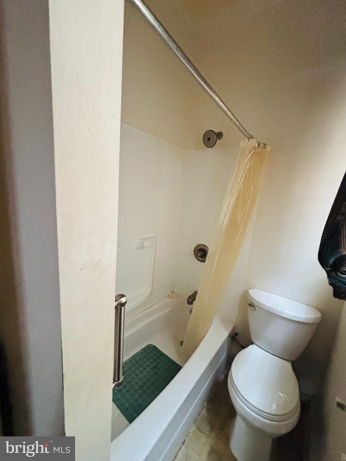 134 North Ruby Street Philadelphia, PA 19139 - Photo 18 of 34 a bathroom with a toilet and a shower
