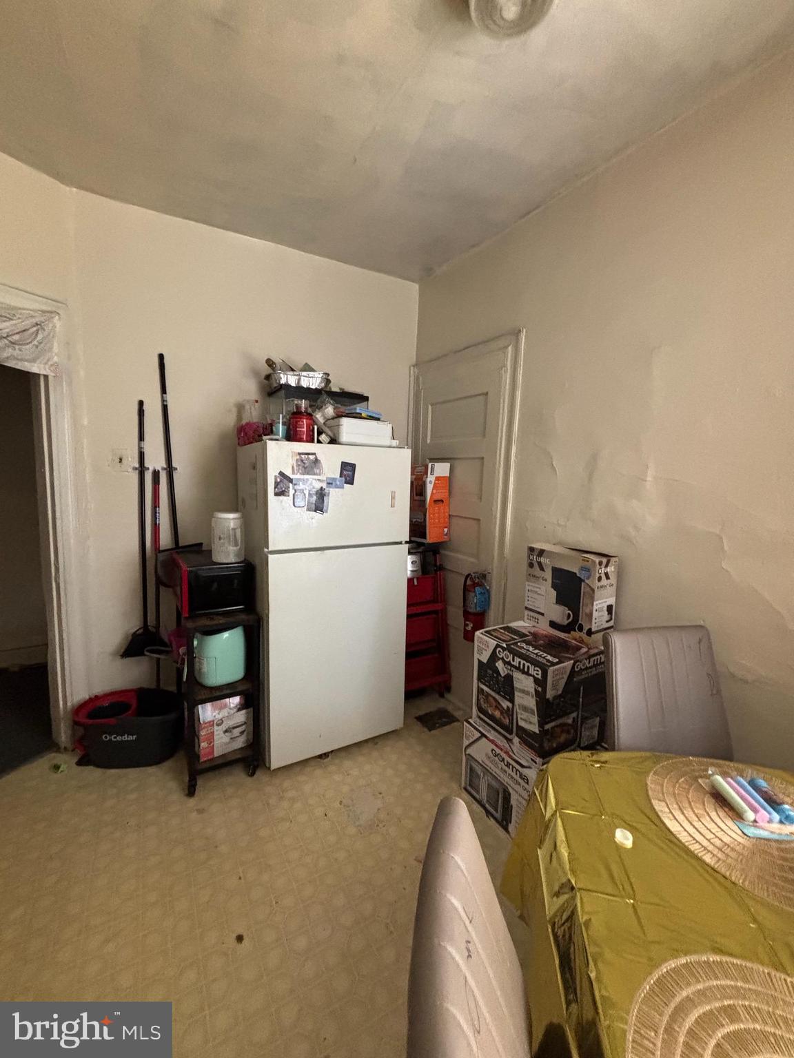134 North Ruby Street Philadelphia, PA 19139 - Photo 21 of 34 a bedroom with a bed and a refrigerator