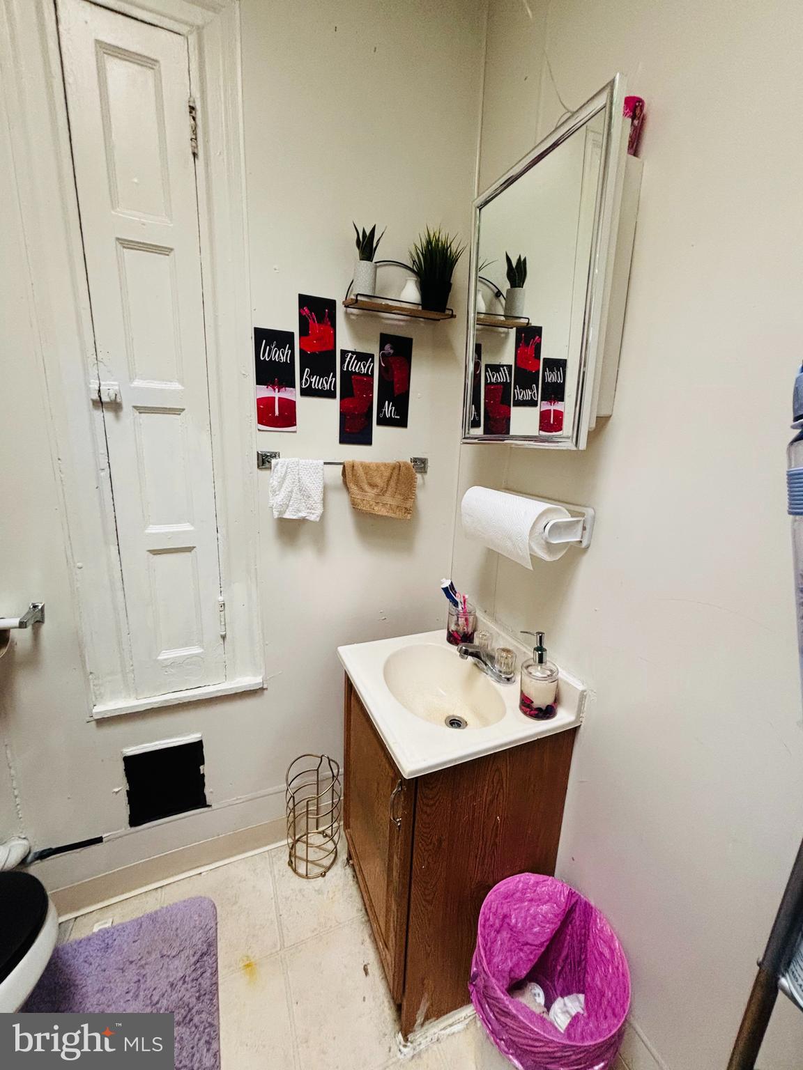 134 North Ruby Street Philadelphia, PA 19139 - Photo 26 of 34 a bathroom with a sink vanity and tub