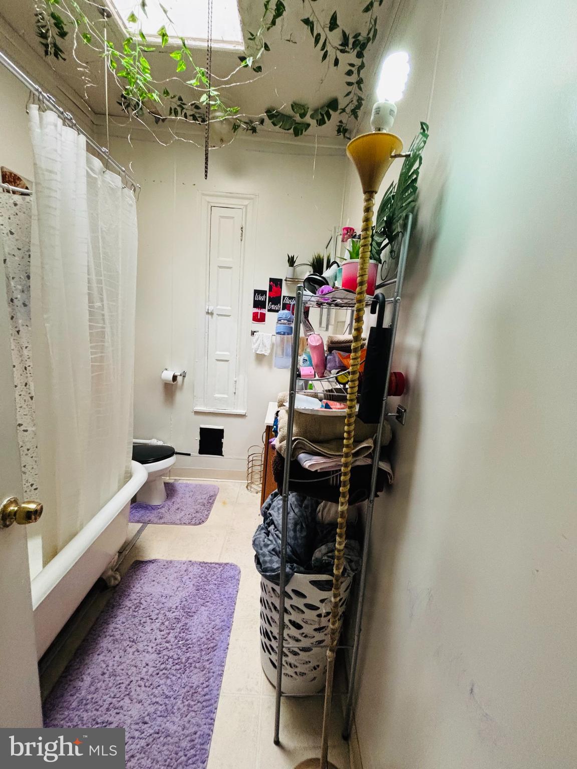 134 North Ruby Street Philadelphia, PA 19139 - Photo 27 of 34 a bed room with a bed and a couch