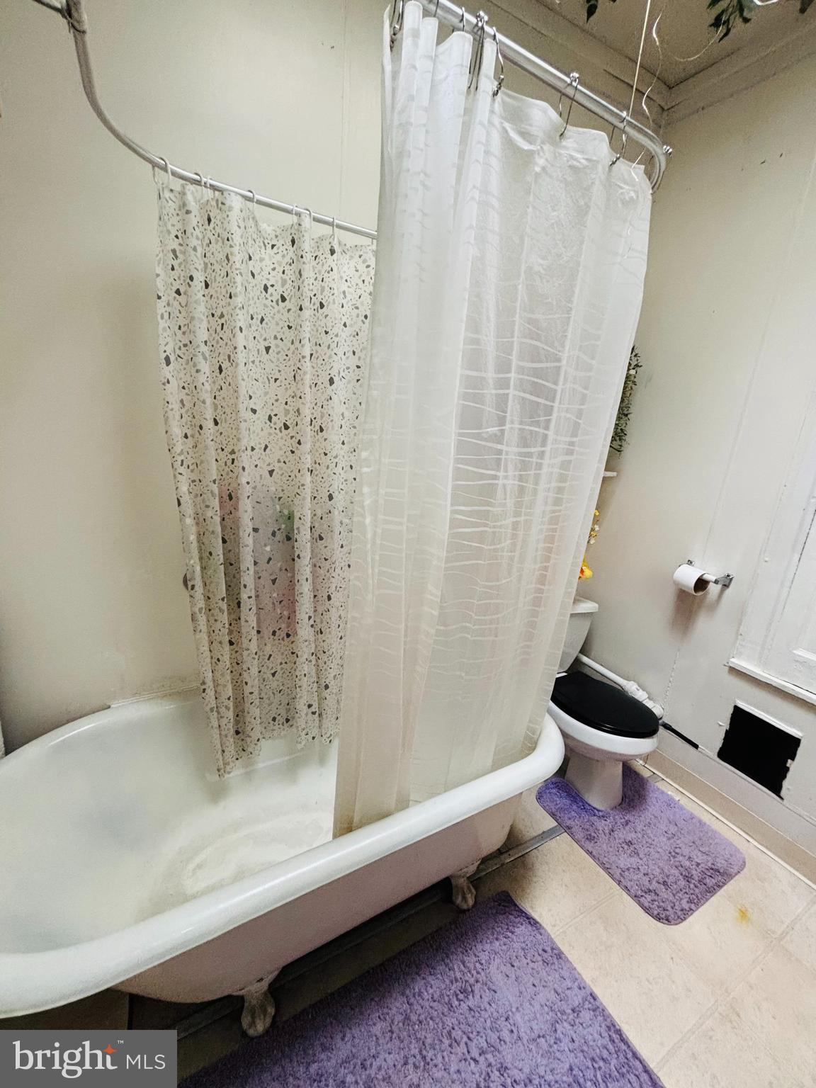 134 North Ruby Street Philadelphia, PA 19139 - Photo 28 of 34 a bathroom with a bathtub and shower