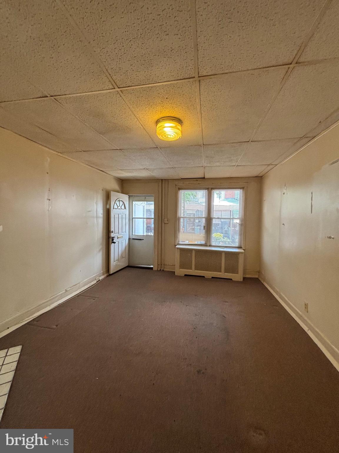 134 North Ruby Street Philadelphia, PA 19139 - Photo 5 of 34 a view of empty room with windows