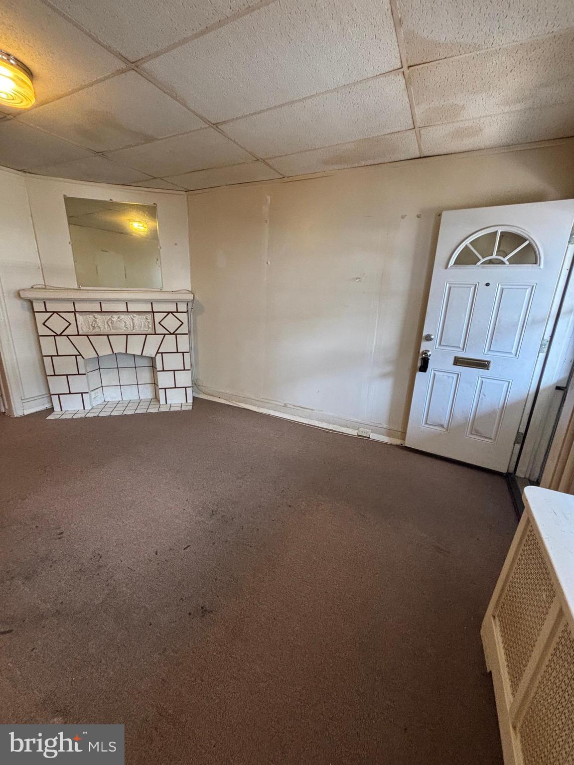 134 North Ruby Street Philadelphia, PA 19139 - Photo 7 of 34 a view of an empty room with a fireplace