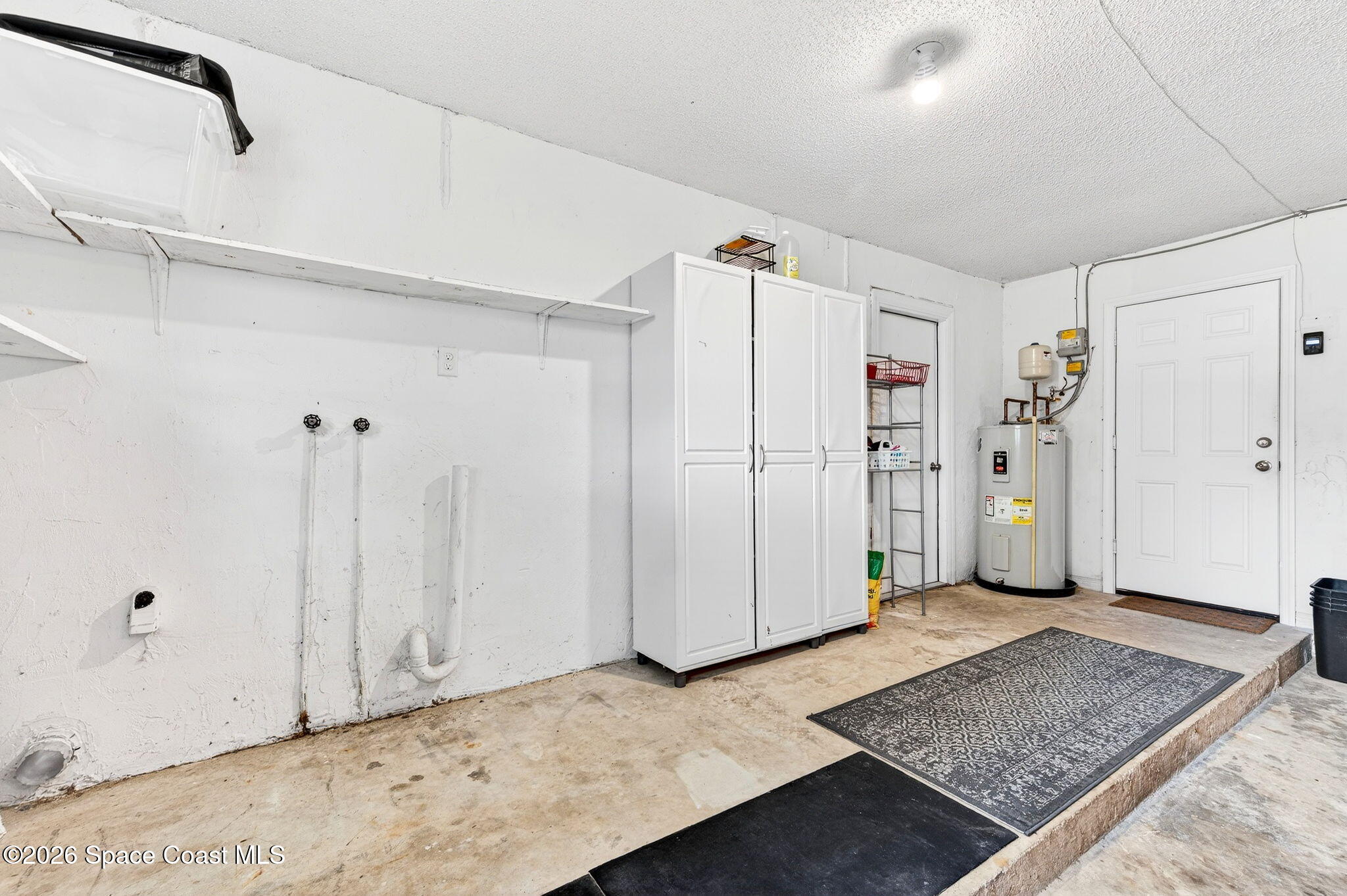 990 Boxford Lane Rockledge, FL 32955 - Photo 17 of 41 a view of entryway with white walls