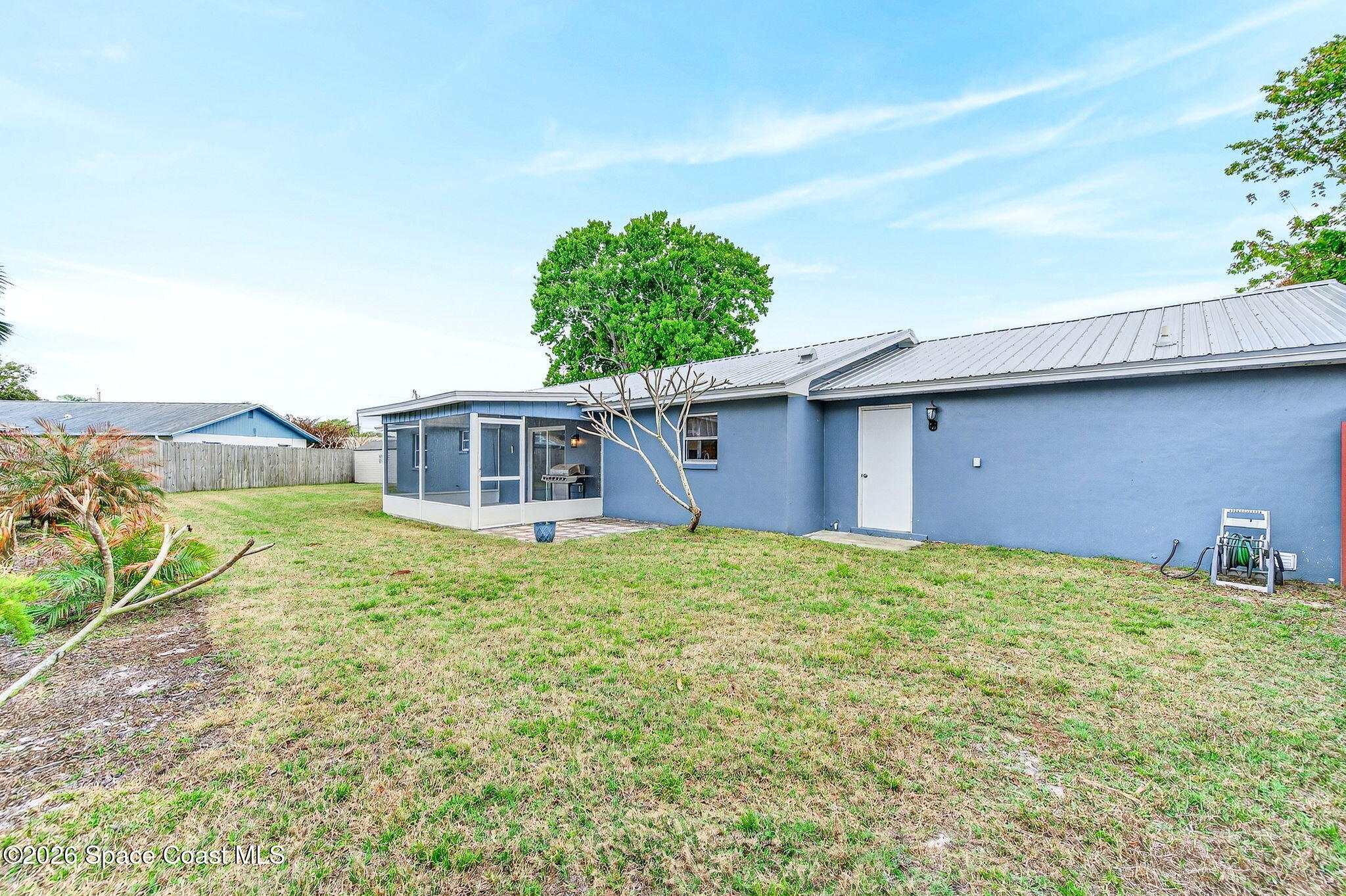 990 Boxford Lane Rockledge, FL 32955 - Photo 36 of 41 a house is sitting in middle of the green field