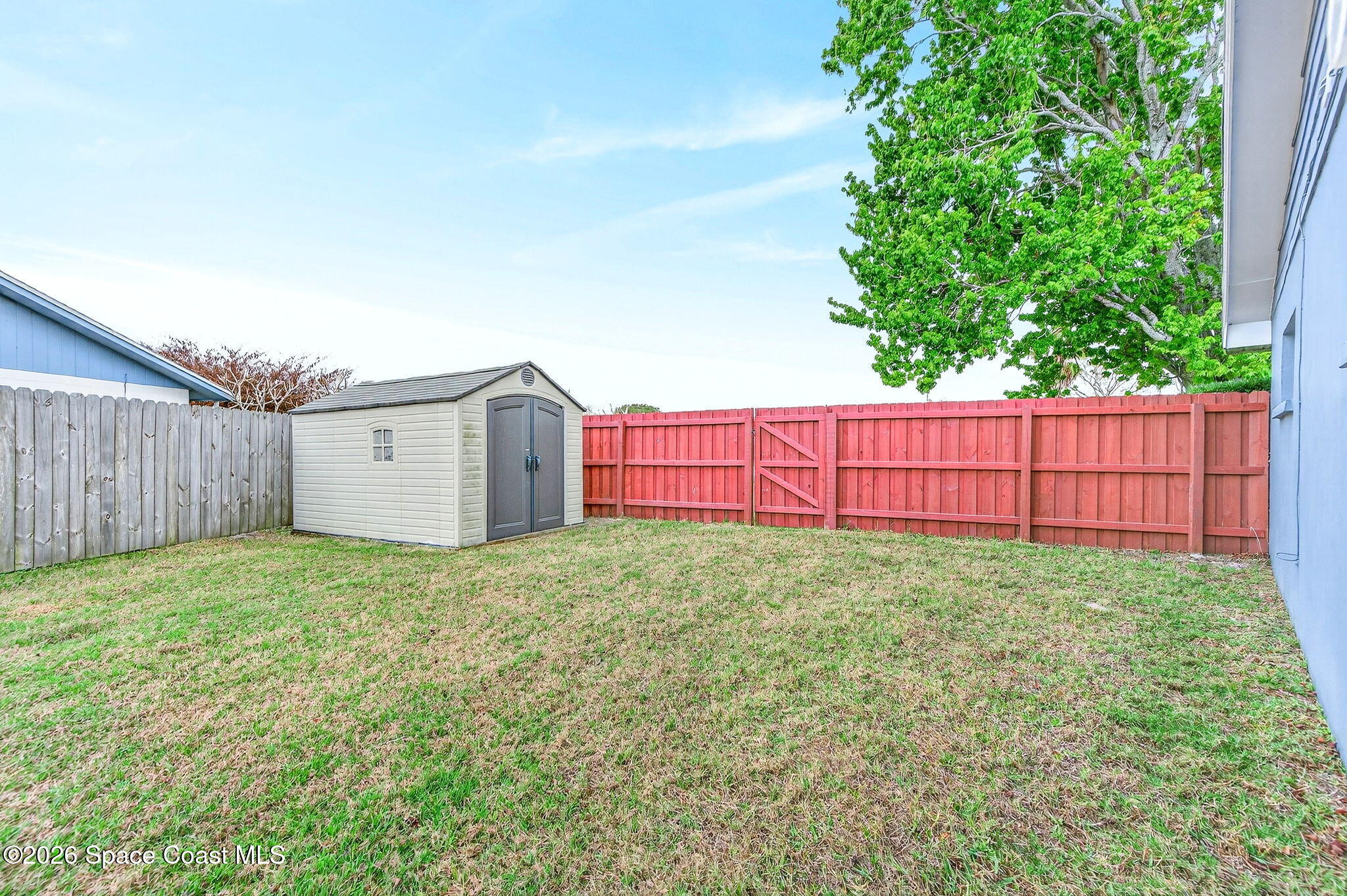 990 Boxford Lane Rockledge, FL 32955 - Photo 38 of 41 a backyard of a house