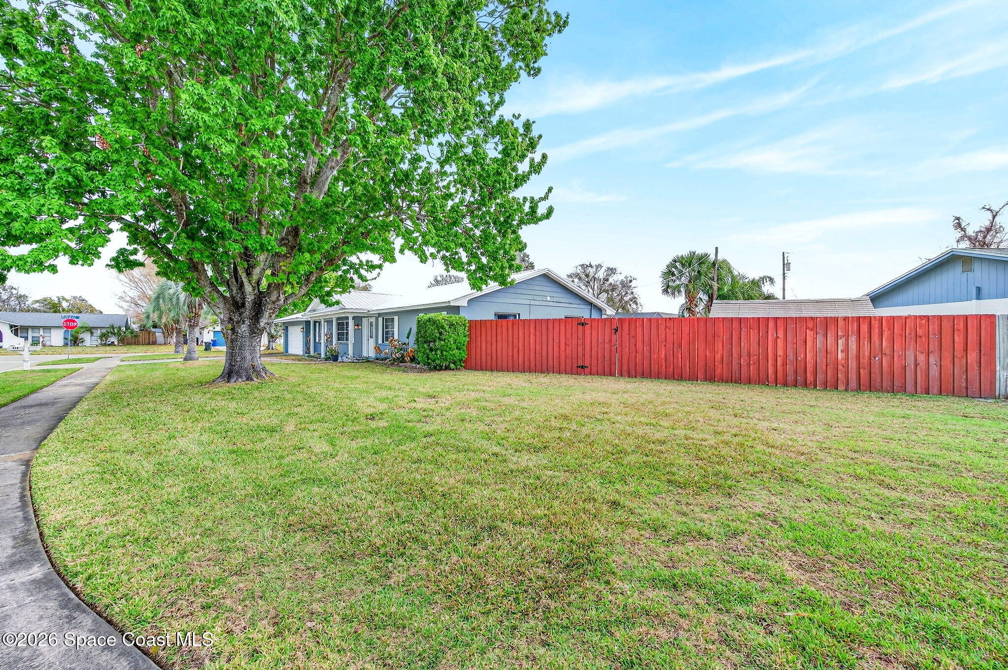 990 Boxford Lane Rockledge, FL 32955 - Photo 40 of 41 a view of a house with a yard