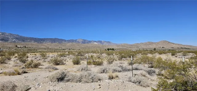 a view of mountain view with mountains in the background