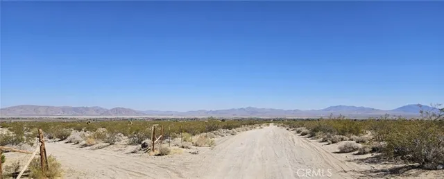 a view of lake and mountain