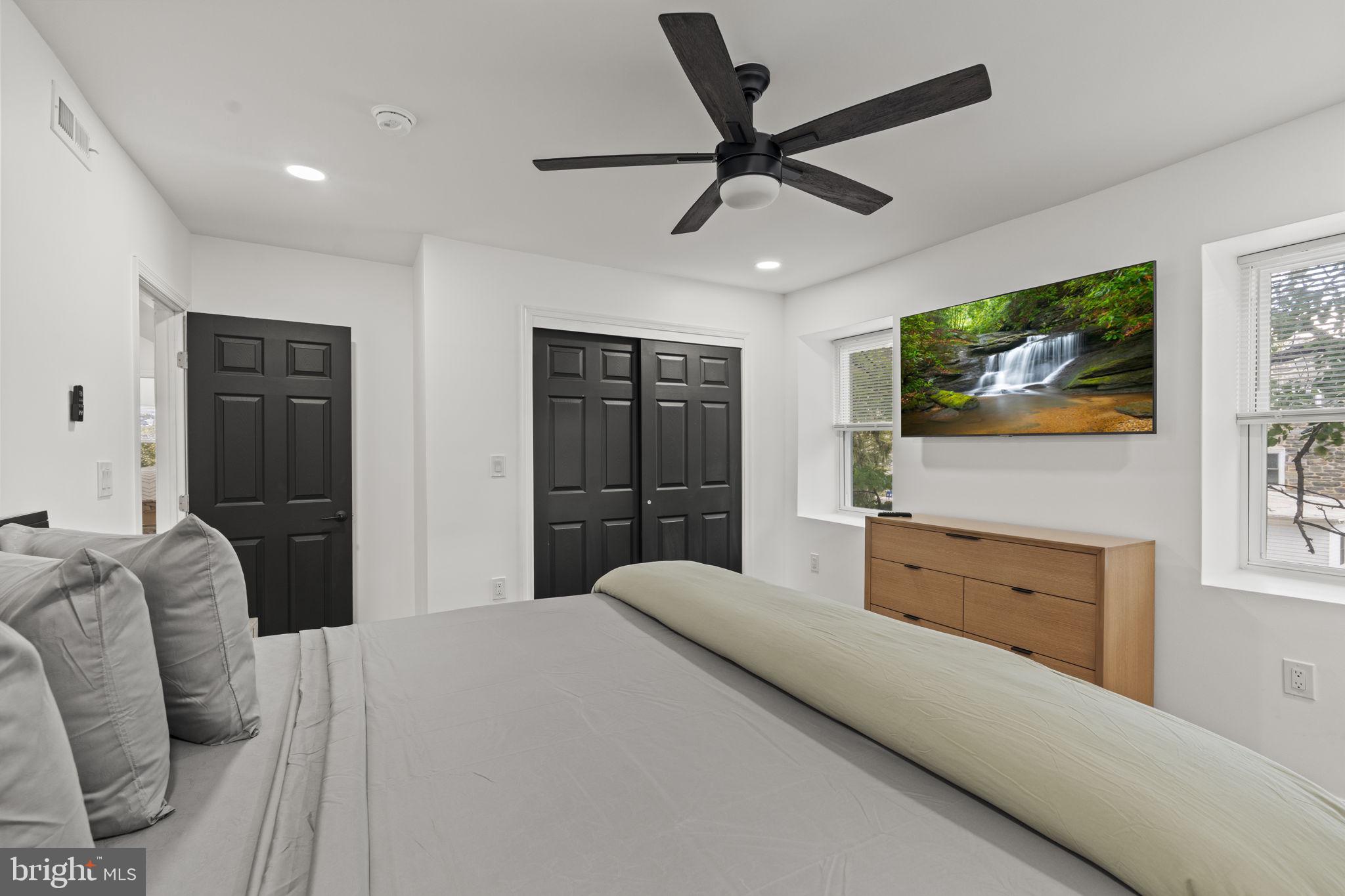 5320 Wynnefield Avenue Philadelphia, PA 19131 - Photo 17 of 33 a bedroom with a bed and a flat screen tv