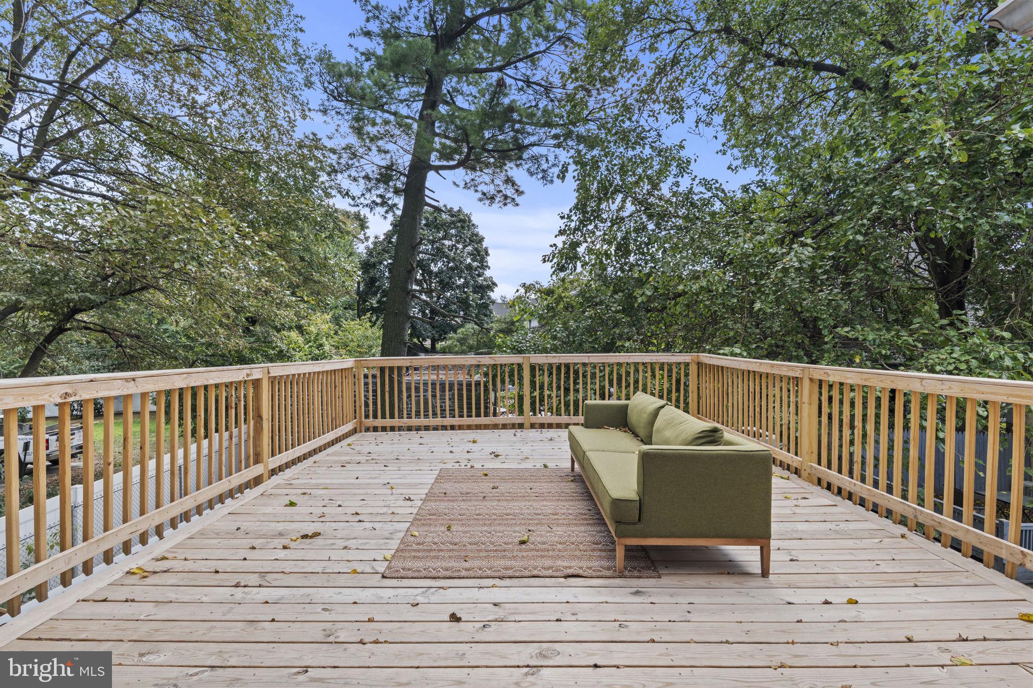 5320 Wynnefield Avenue Philadelphia, PA 19131 - Photo 18 of 33 a balcony with wooden floor and fence