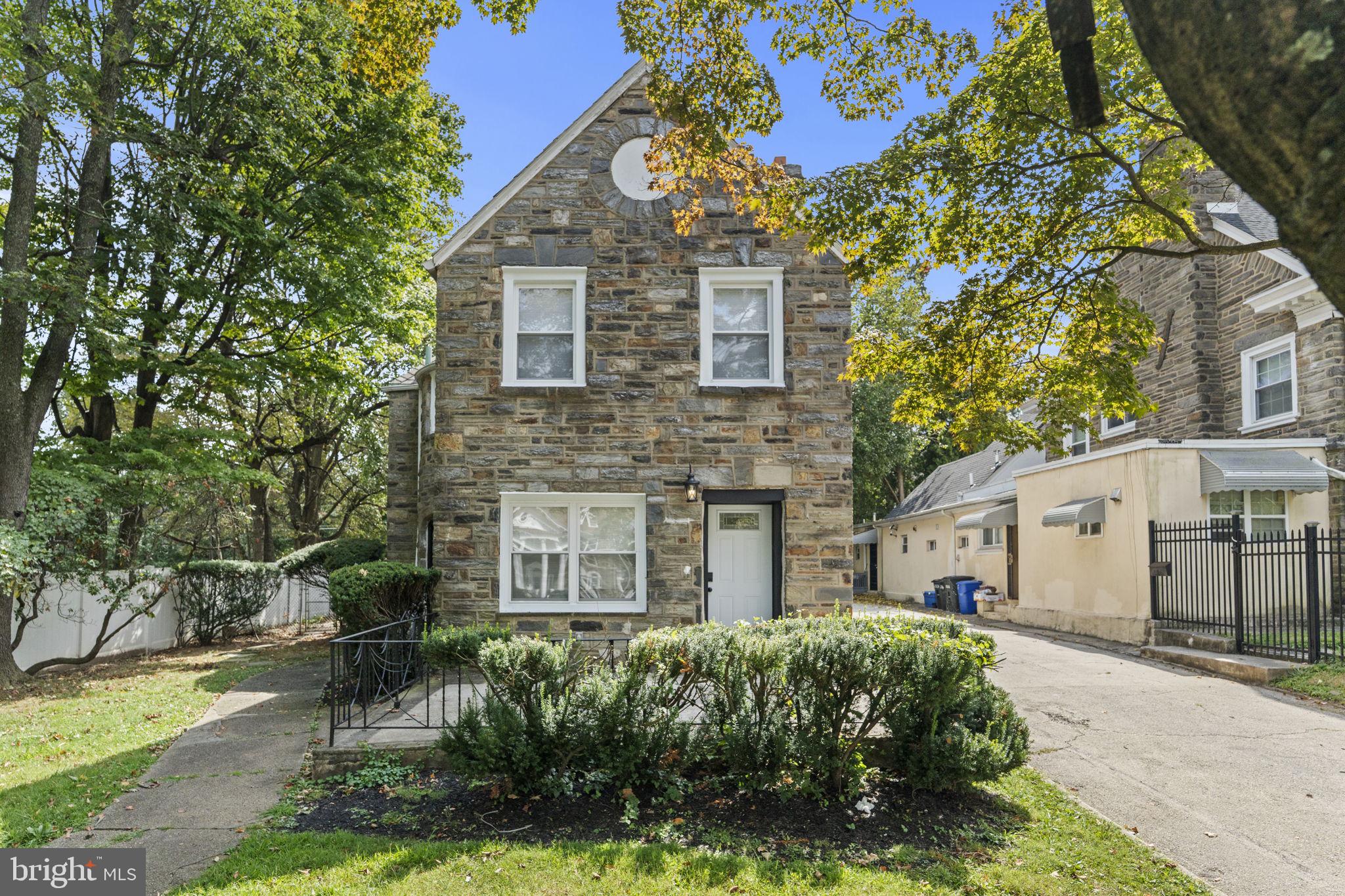 5320 Wynnefield Avenue Philadelphia, PA 19131 - Photo 2 of 33 a front view of a house with garden