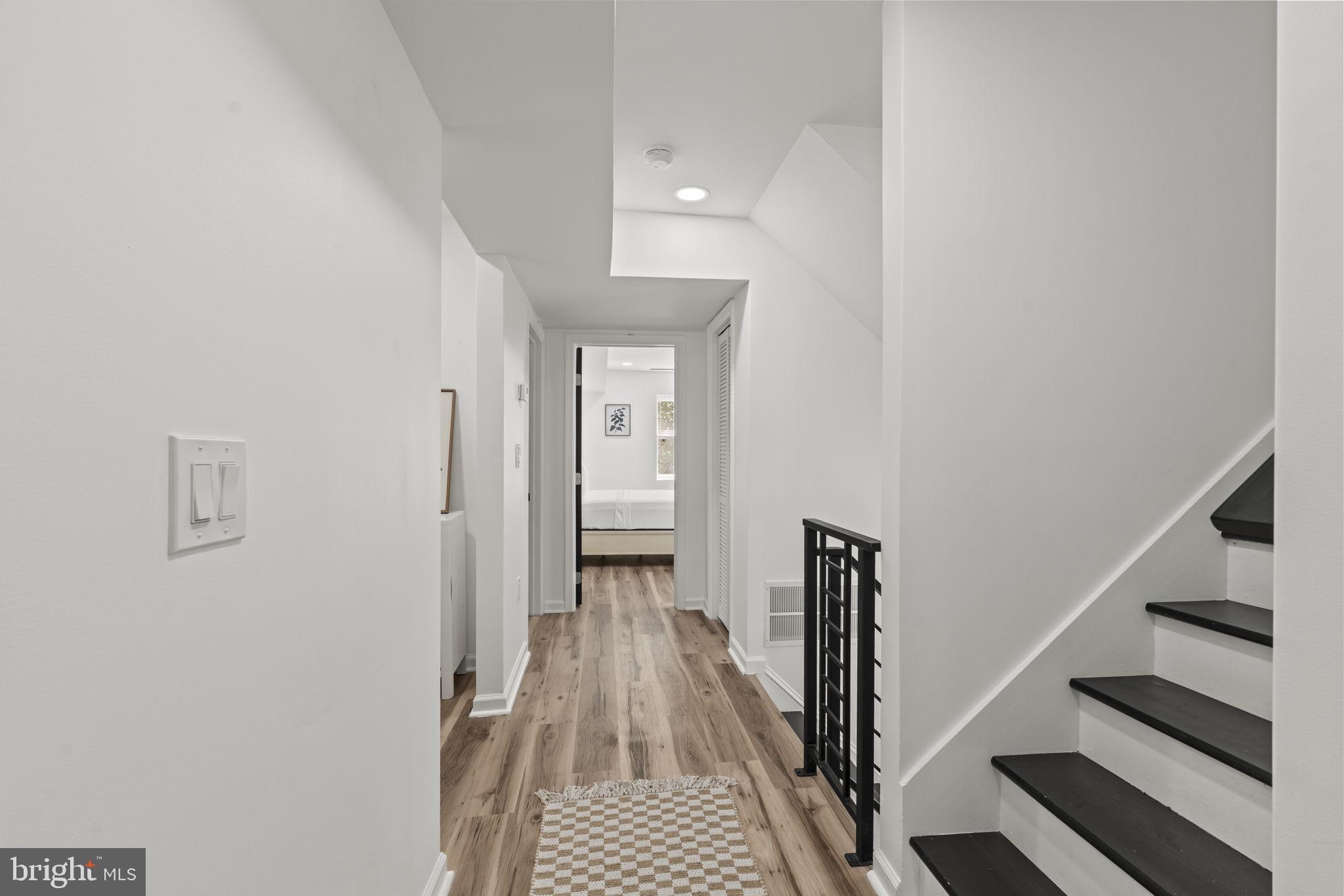 5320 Wynnefield Avenue Philadelphia, PA 19131 - Photo 21 of 33 a view of a hallway with wooden floor and entryway